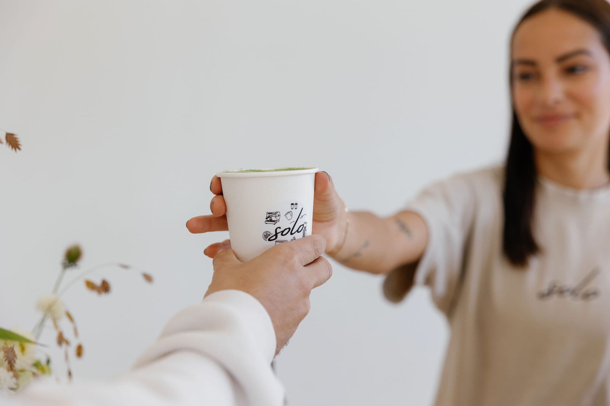 Coffee cup handoff - Solo Coffee Cart service